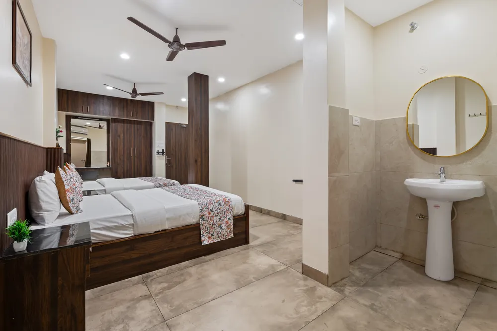 Cozy room interior at Veeras Inn Thiruvallur